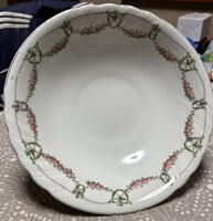 Antique bowl with a rose garland