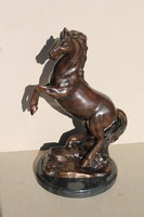 Bronze statue of a prancing horse