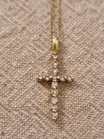 Marked 10k gold cross pendant with chain