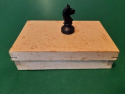 Old chess pieces in their original box