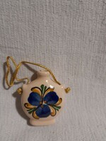 Small flat ceramic ornament with blue floral glaze