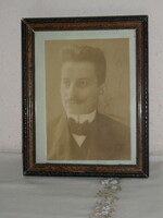 Old portrait in wooden picture frame, picture frame