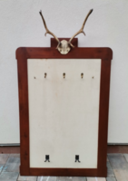 Huge hunter with antlers in an art-deco frame. Negotiable.