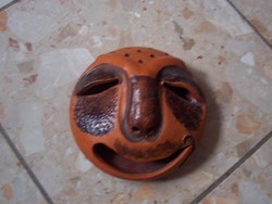 Wall ceramic cheerful head