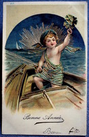 Antik arannyal préselt Újévi üdvözlő képeslap -kis matróz hajón, 4levelű lóhere , aranyló naplemente