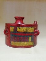 Glazed ceramic drink spout with a unique shape