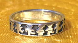Silver hoop ring with a teddy bear motif dancing in a circle