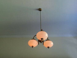 Almost new, copper chandelier treated against oxidation, that's all!