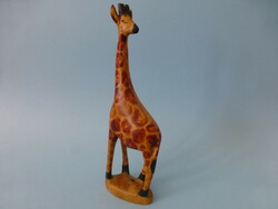 Carved wooden giraffe statue