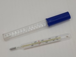 Mercury thermometer, with crown marking, in a plastic case
