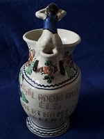 Large, putto, inscribed, glazed ceramic folk jug