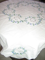 Beautiful crochet lace inlay with cross stitch embroidered floral needlework tablecloth