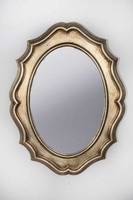 Oval mirror with gilded wooden frame