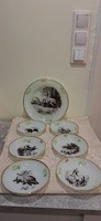 Set of glass plates with hunter's scene and compote cakes.