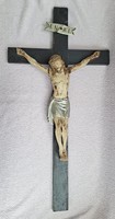 Antique wooden cross with Jesus crucified