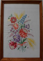 Hand embroidery in a pine frame