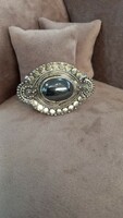 Antique silver brooch with hematite