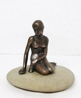 The Little Mermaid - Copenhagen - bronze figure on flat pebbles - bronze, stone