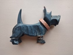 Retro three-legged damaged wooden dog