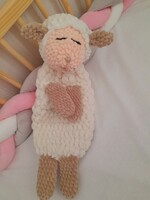 Hand crocheted sleeping plush lamb.