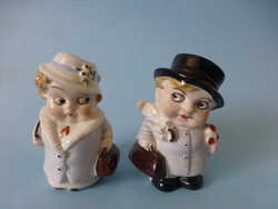 Antique German spice holder figurines. Little girl and little boy salt and pepper shakers.