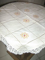 Damask tablecloth with a beautiful Christmas pattern embroidered with a lace edge