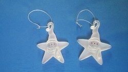 Two opal glass Christmas tree ornaments: a star with a snowman head