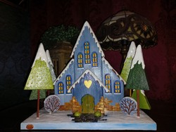 Handmade winter, Christmas decoration, church (house, cottage) made of recycled wood