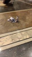 Silver miniature snail is rich in detail. Rare.