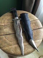 Old handmade Malay dagger with horn handle in leather sheath