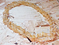 Long string of citrine mineral beads