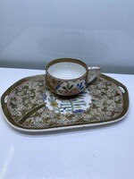 Old serving bowl with small cup