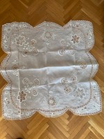 White, crocheted embroidered tablecloth