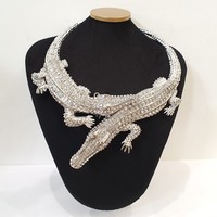 Silver colored crystal alligator necklace