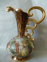 Beautiful antique baroque carafe with a richly gilded scene