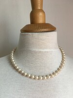 White teal knotted necklace
