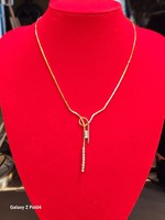 18.K gold necklaces brilliantly embellished