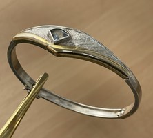 Sterling silver bracelet with blue topaz