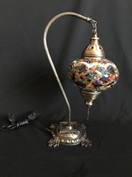 Richly decorated Moroccan lamp with mosaic shade.
