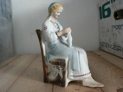 Sewing lady, porcelain statue