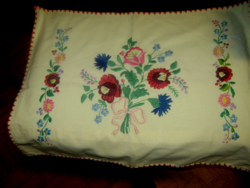 Old embroidered decorative pillow