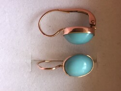 Antique gold earrings with a turquoise stone