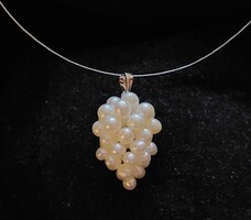 Real cultured pearl pendant in the shape of a grape cluster on a metal thread