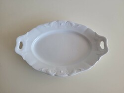 Old white porcelain serving oval bowl with a handle