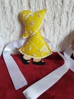 Yellow sunbonnet curtain tie