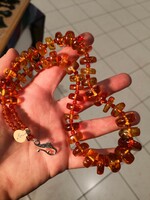Real amber necklace, neck blue