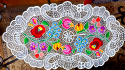 Colorful oval tablecloth made with Riseliős technique