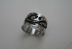 Wide silver ring with an Indian motif