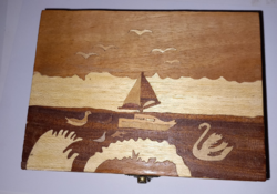 Sale of handmade products in a wooden box with marquetry technique