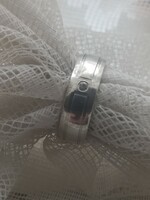 Women's hoop silver ring with a small stone